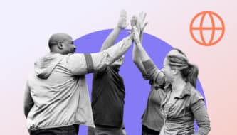 Black and white image of two women and two men respectively high-fiving each other at the same time to signal their joint strong readiness in mission-driven projects.