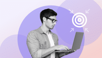 a man using laptop with some symbols around